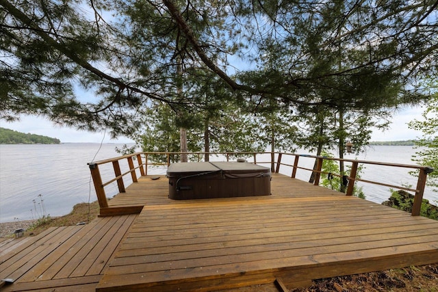 2236 Birch Point Rd Unit A, Tower, MN 55790 - dock featuring a hot tub and a deck with water view