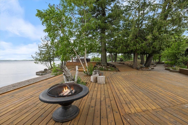 2236 Birch Point Rd Unit A, Tower, MN 55790 - deck with an outdoor fire pit and a water view