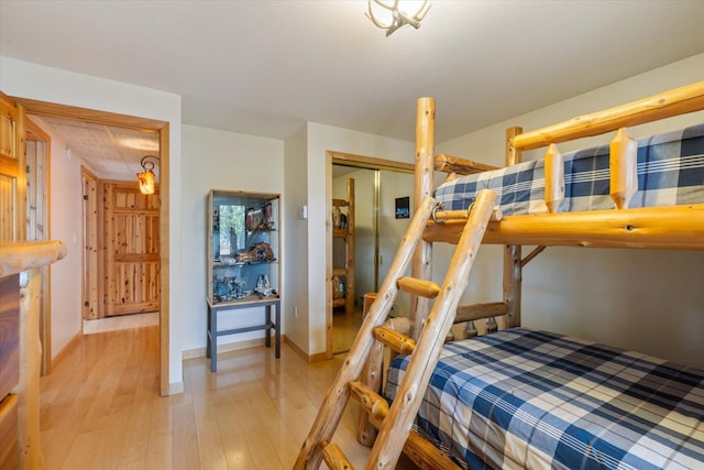 2236 Birch Point Rd Unit A, Tower, MN 55790 - bedroom featuring a closet and light wood-type flooring