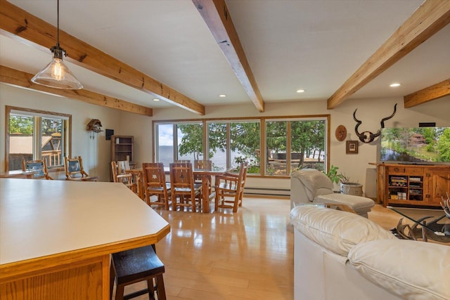 2236 Birch Point Rd Unit A, Tower, MN 55790 - dining space with beam ceiling, plenty of natural light, recessed lighting, a baseboard radiator, and light wood-type flooring