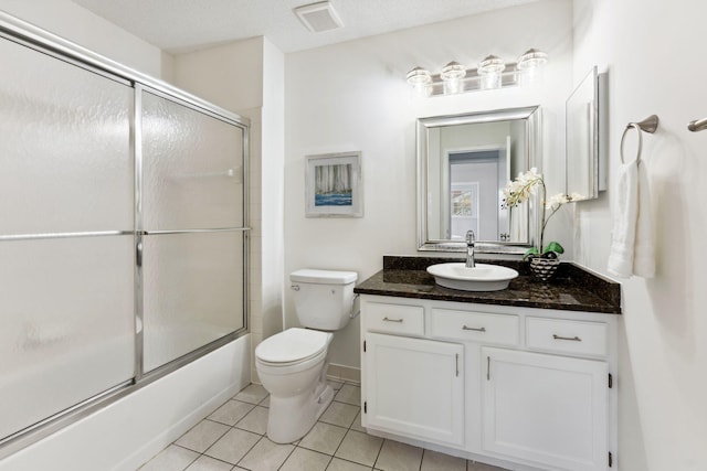 2060 Shenandoah Ct Unit F, Plymouth, MN 55447 - bathroom with vanity, tile patterned flooring, and combined bath / shower with glass door