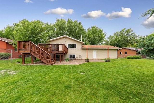 2115 3rd Ave NE, Owatonna, MN 55060 - back of house featuring a deck, stairway, and a patio