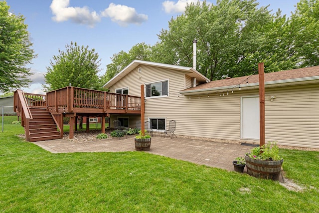 2115 3rd Ave NE, Owatonna, MN 55060 - rear view of house with a patio, a wooden deck, and stairs