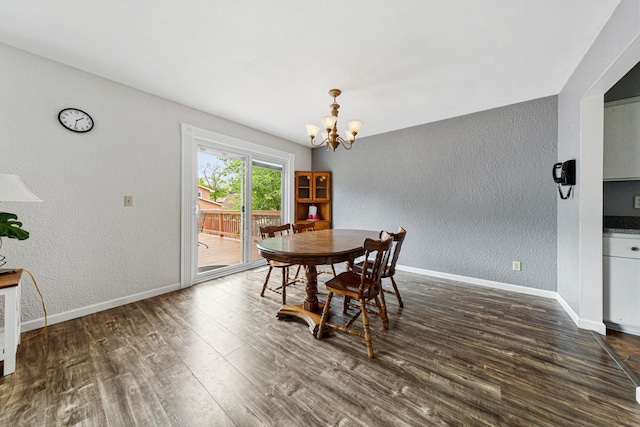 2115 3rd Ave NE, Owatonna, MN 55060 - dining area featuring a textured wall, a chandelier, and wood finished floors