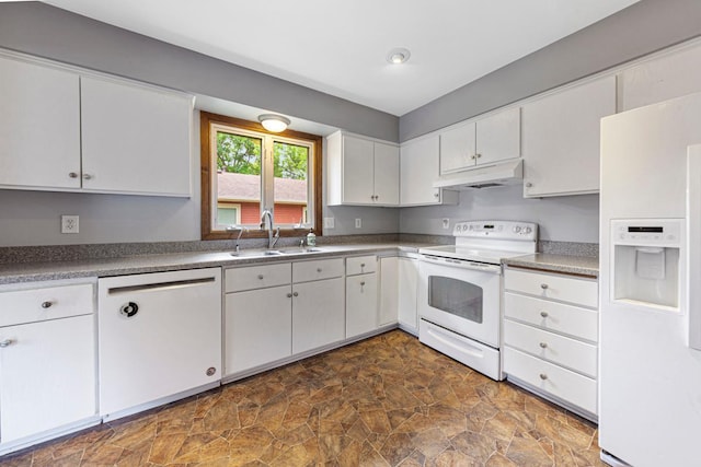 2115 3rd Ave NE, Owatonna, MN 55060 - kitchen with white appliances, under cabinet range hood, white cabinets, and stone finish flooring