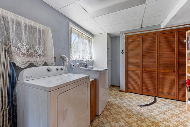 2115 3rd Ave NE, Owatonna, MN 55060 - washroom with washer and clothes dryer and light floors