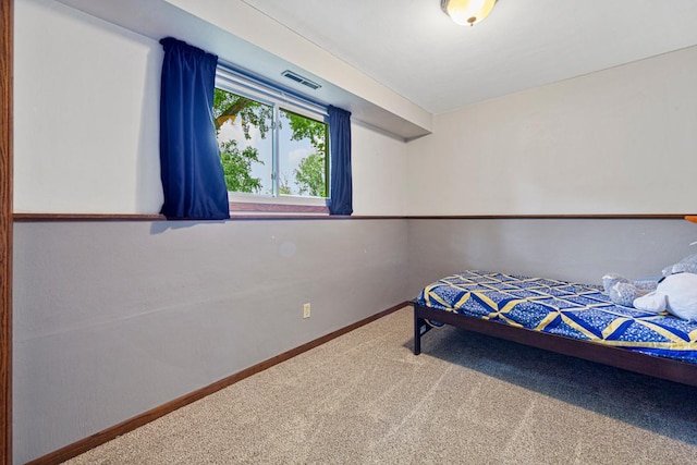 2115 3rd Ave NE, Owatonna, MN 55060 - carpeted bedroom featuring baseboards