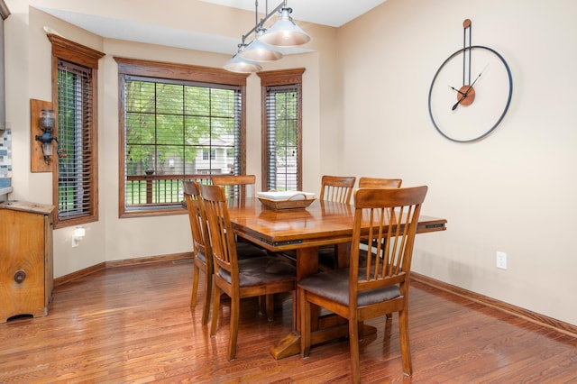 1805 Maple Ln, Saint Cloud, MN 56304 - dining room featuring light wood-style floors and baseboards