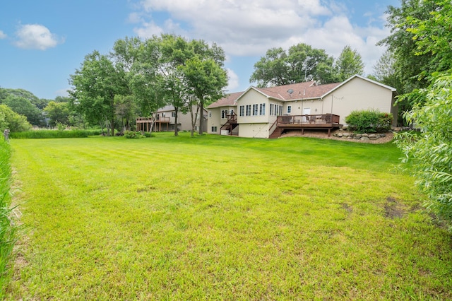 1805 Maple Ln, Saint Cloud, MN 56304 - view of grassy yard featuring a deck and stairway