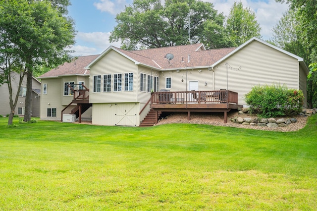 1805 Maple Ln, Saint Cloud, MN 56304 - rear view of house featuring stairway, a wooden deck, a lawn, and roof with shingles