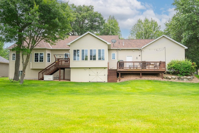 1805 Maple Ln, Saint Cloud, MN 56304 - back of property with stairway, a deck, a lawn, and a shingled roof