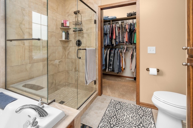 1805 Maple Ln, Saint Cloud, MN 56304 - full bath featuring a garden tub, a shower stall, tile patterned floors, and a spacious closet