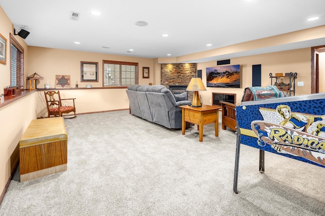 1805 Maple Ln, Saint Cloud, MN 56304 - living area with carpet flooring, a fireplace, and recessed lighting