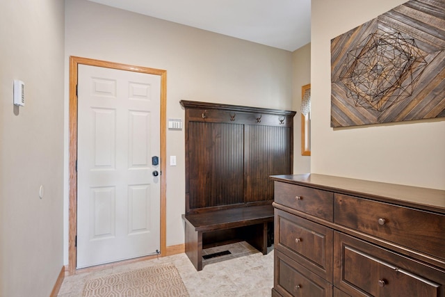 9015 Schutte Ct, Corcoran, MN 55340 - mudroom featuring baseboards and light tile patterned flooring