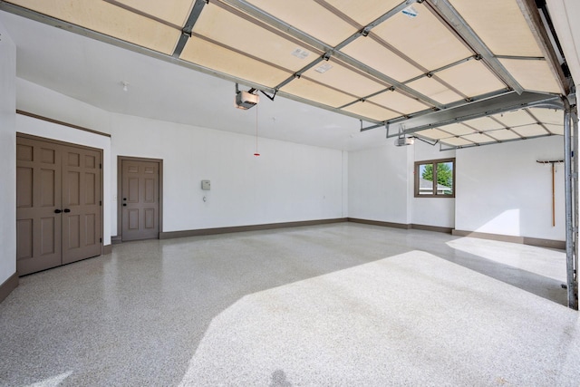 9015 Schutte Ct, Corcoran, MN 55340 - garage featuring a garage door opener