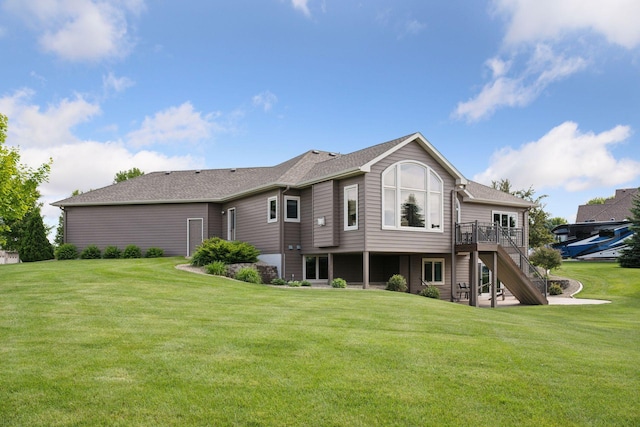 9015 Schutte Ct, Corcoran, MN 55340 - rear view of house featuring stairway, a deck, and a yard