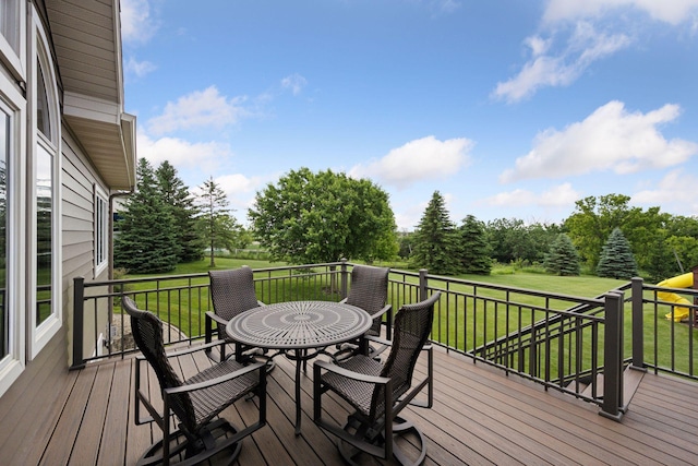 9015 Schutte Ct, Corcoran, MN 55340 - wooden terrace featuring a yard