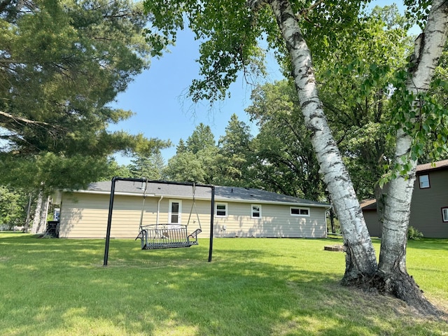 17535 Riverwood Dr, Little Falls, MN 56345 - rear view of property with a yard