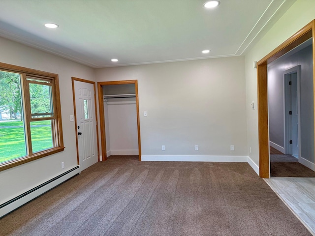 17535 Riverwood Dr, Little Falls, MN 56345 - unfurnished bedroom featuring a baseboard radiator, recessed lighting, and carpet floors