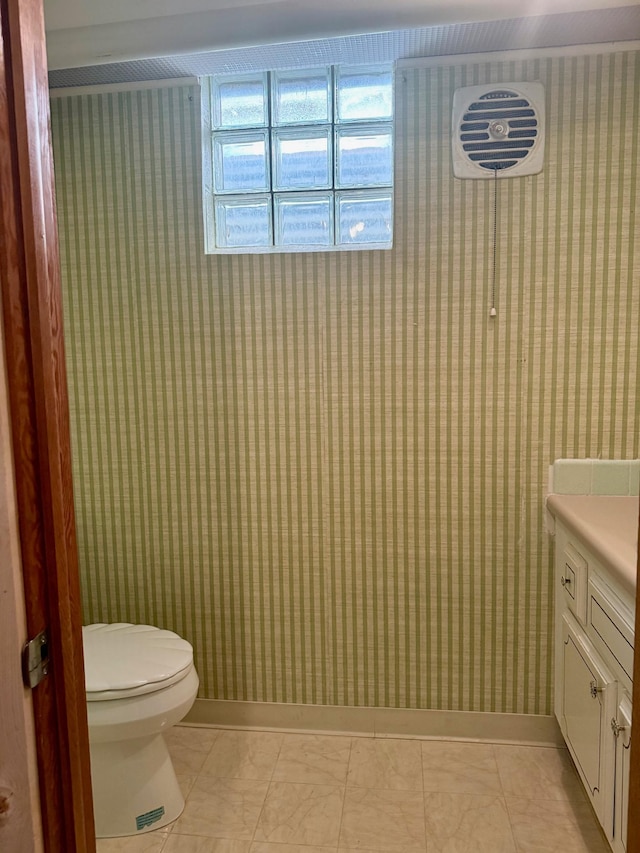17535 Riverwood Dr, Little Falls, MN 56345 - bathroom with wallpapered walls and vanity