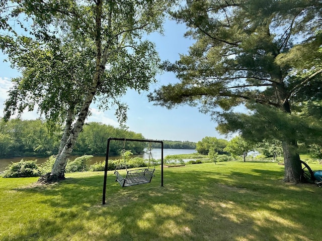 17535 Riverwood Dr, Little Falls, MN 56345 - view of community featuring a water view and a yard