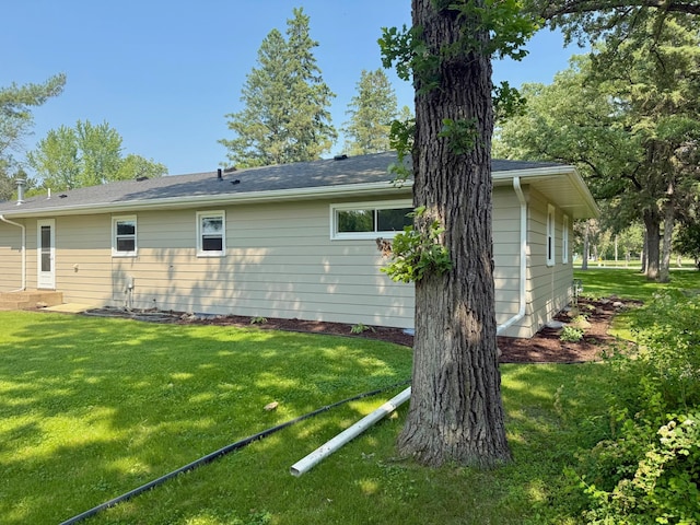 17535 Riverwood Dr, Little Falls, MN 56345 - rear view of house featuring a lawn
