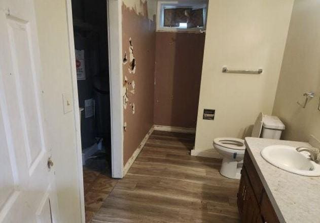 1019 Trott Ave SW, Willmar, MN 56201 - bathroom with vanity and wood finished floors