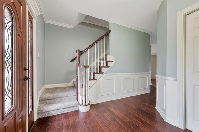1830 Whitetail Run Pl NE, Owatonna, MN 55060 - foyer with dark wood finished floors, stairway, ornamental molding, plenty of natural light, and wainscoting
