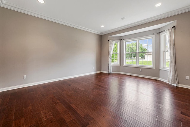 1830 Whitetail Run Pl NE, Owatonna, MN 55060 - spare room featuring ornamental molding, dark wood-type flooring, and recessed lighting
