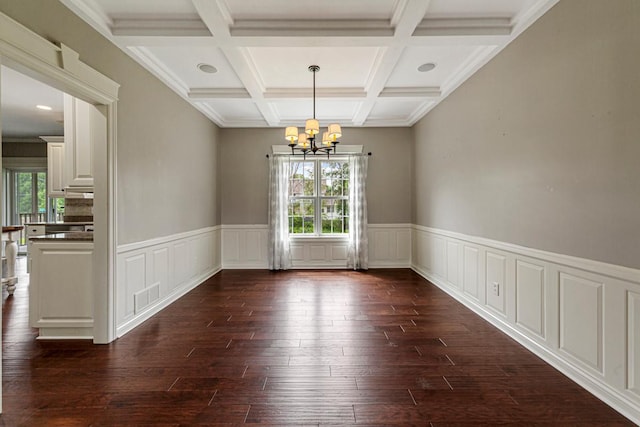 1830 Whitetail Run Pl NE, Owatonna, MN 55060 - spare room with a chandelier, healthy amount of natural light, dark wood-style floors, beam ceiling, and a wainscoted wall