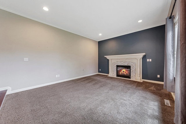 1830 Whitetail Run Pl NE, Owatonna, MN 55060 - unfurnished living room with carpet, recessed lighting, a fireplace, and crown molding