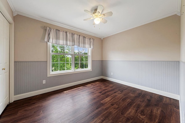 1830 Whitetail Run Pl NE, Owatonna, MN 55060 - spare room with wood finished floors, wainscoting, a ceiling fan, and crown molding