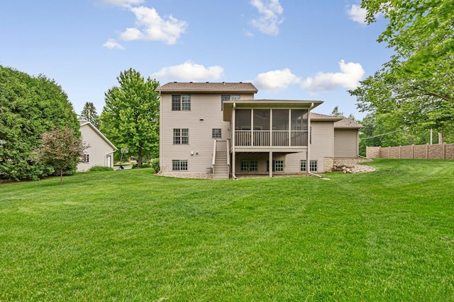 1830 Whitetail Run Pl NE, Owatonna, MN 55060 - rear view of house featuring a sunroom and a yard