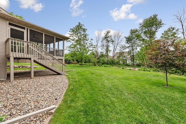 1830 Whitetail Run Pl NE, Owatonna, MN 55060 - view of green lawn with a sunroom and stairway