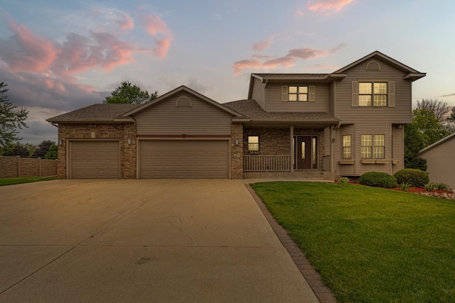 1830 Whitetail Run Pl NE, Owatonna, MN 55060 - view of front of property with concrete driveway, a garage, a porch, brick siding, and roof with shingles
