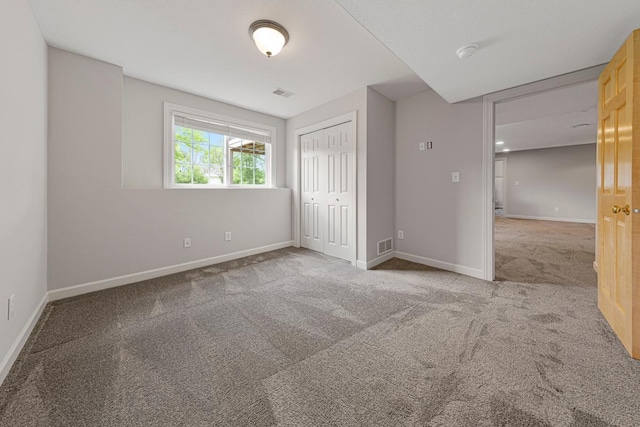1830 Whitetail Run Pl NE, Owatonna, MN 55060 - unfurnished bedroom with carpet and a closet