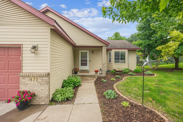 620 Acacia Dr S, Annandale, MN 55302 - entrance to property with an attached garage and a lawn