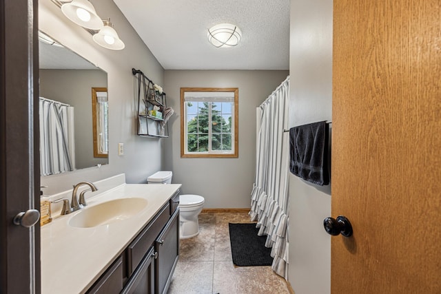 620 Acacia Dr S, Annandale, MN 55302 - full bathroom featuring vanity, a shower with shower curtain, a textured ceiling, and tile patterned floors