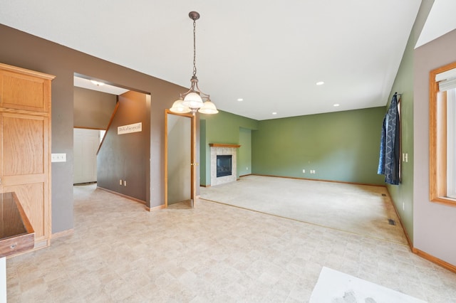 936 Waterford Way, Jordan, MN 55352 - unfurnished living room with a fireplace and recessed lighting