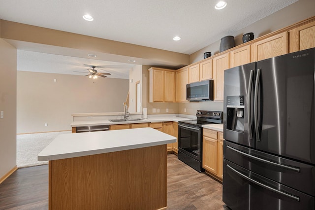 1471 111th Dr NE Unit B, Blaine, MN 55449 - kitchen featuring stainless steel appliances, light brown cabinets, ceiling fan, light wood-style floors, and recessed lighting