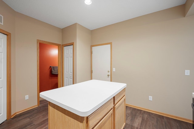 1471 111th Dr NE Unit B, Blaine, MN 55449 - kitchen featuring dark wood finished floors, light countertops, a center island, and recessed lighting