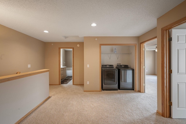 1471 111th Dr NE Unit B, Blaine, MN 55449 - washroom featuring independent washer and dryer, light colored carpet, recessed lighting, and a textured ceiling