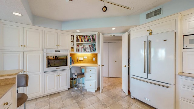 600 4th St SW Unit 401, Rochester, MN 55902 - home office with recessed lighting and built in desk