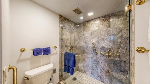 600 4th St SW Unit 401, Rochester, MN 55902 - bathroom with a shower stall and a textured ceiling