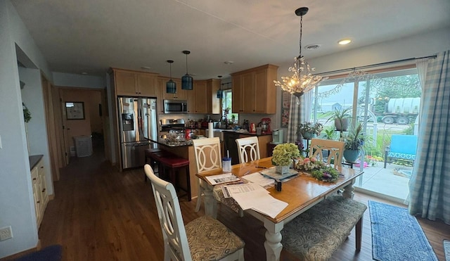 418 Alfred Ct SW, Eyota, MN 55934 - dining area with dark wood-type flooring, a chandelier, and recessed lighting