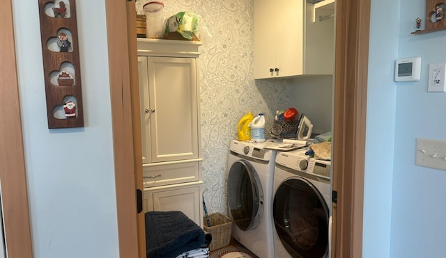 418 Alfred Ct SW, Eyota, MN 55934 - laundry area with wallpapered walls, independent washer and dryer, and cabinet space