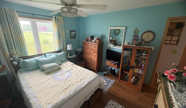 418 Alfred Ct SW, Eyota, MN 55934 - bedroom featuring wood finished floors and ceiling fan