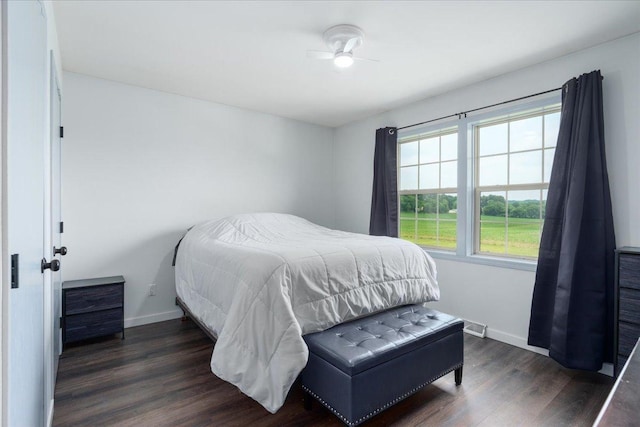E633 950th Ave, Stanton Twp, WI 54734 - bedroom featuring baseboards and wood finished floors