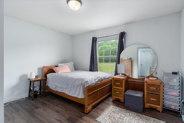 E633 950th Ave, Stanton Twp, WI 54734 - bedroom featuring dark wood-style floors