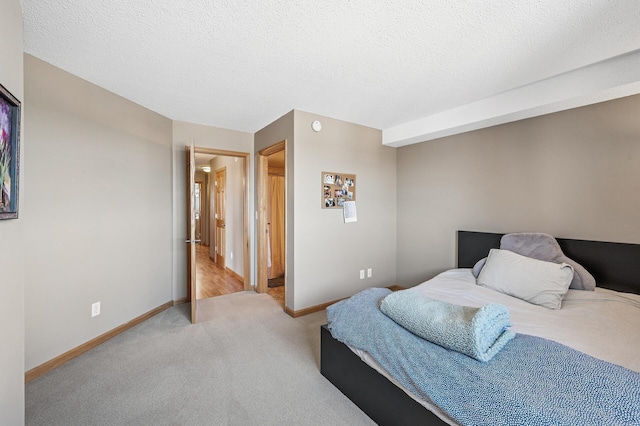 78 10th St E Unit 2901, Saint Paul, MN 55101 - bedroom with carpet floors and a textured ceiling